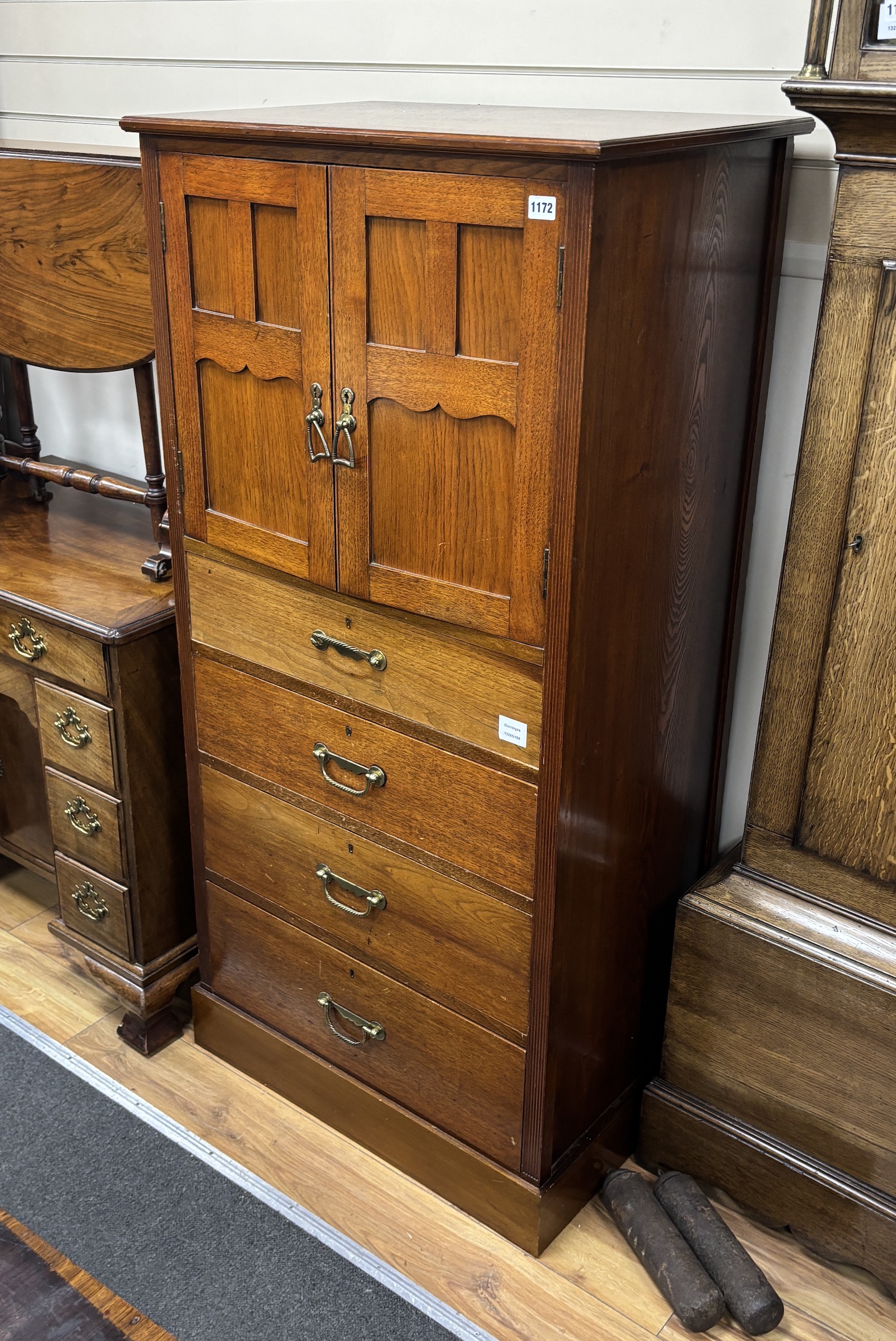 An Arts & Crafts mahogany cupboard, width 70cm, depth 49cm, height 146cm